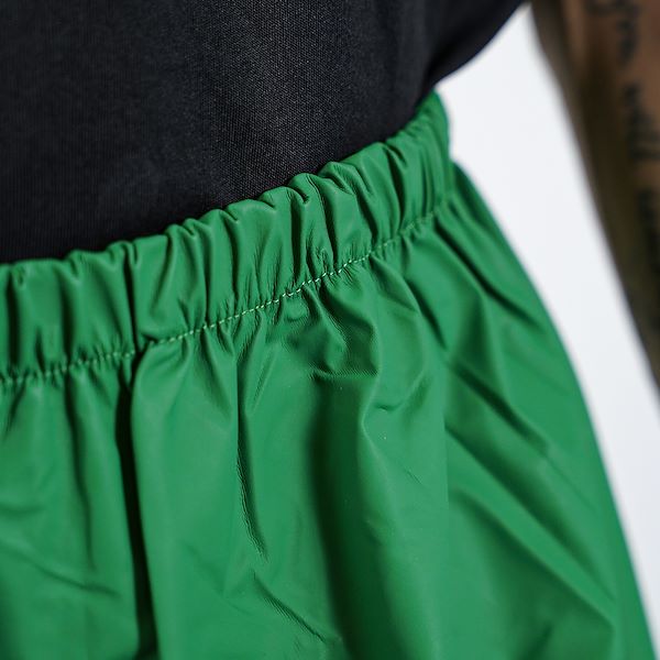 Trousers made of green polyurethane tissue