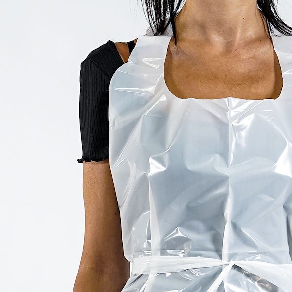 Disposable aprons made of white polyethylene